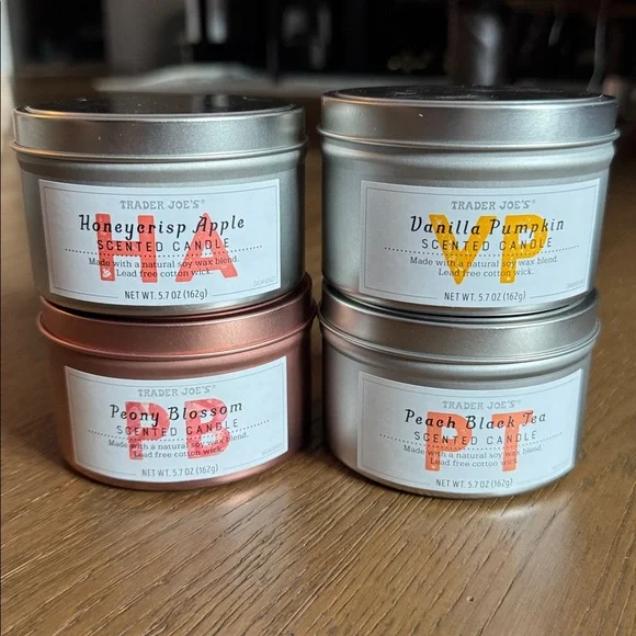 Trader Joe’s Candles NEW set of 4 - peach black tea pumpkin peony blossom apple - Picture 1 of 3
